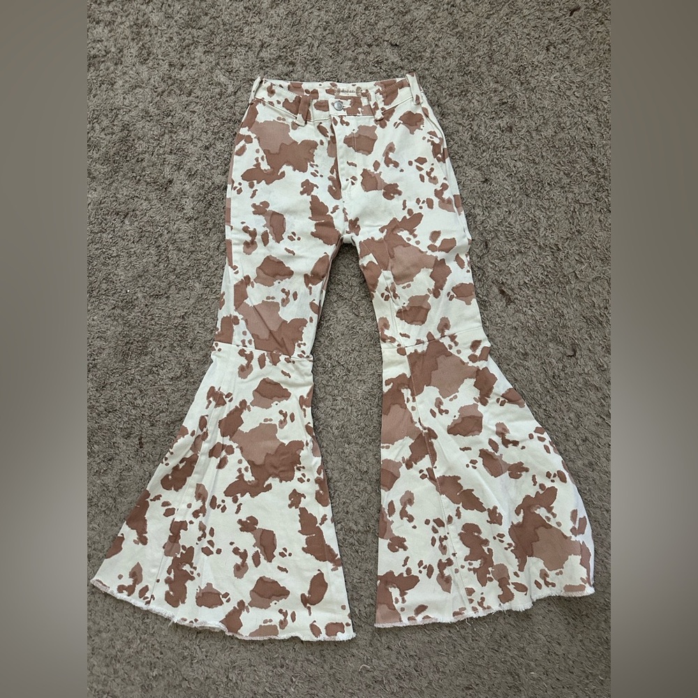 Worn once! Alter’d State Cow Print Flare jeans